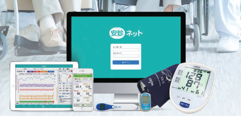 タブレットで健康情報を確認する職員